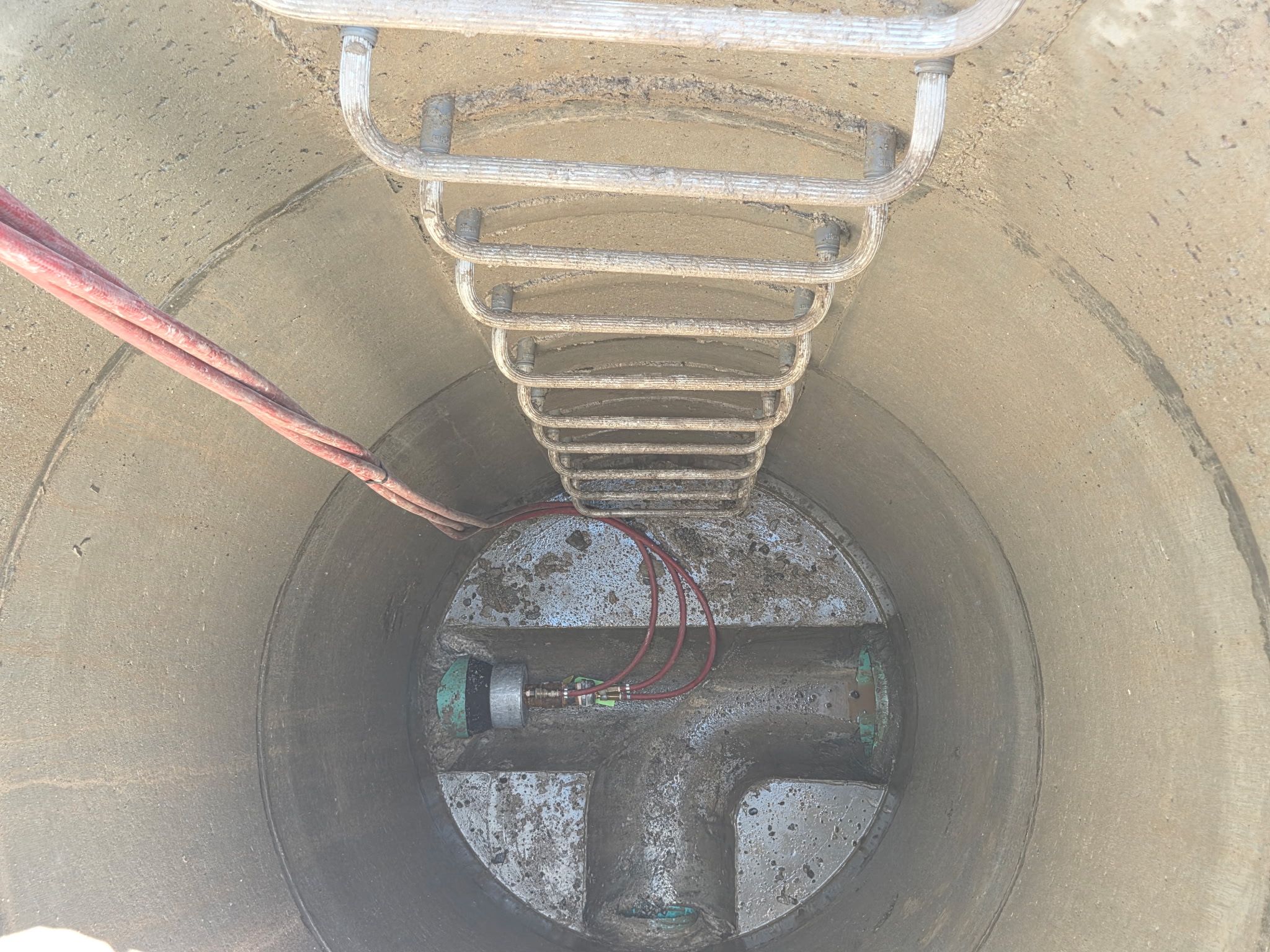Sewer CCTV camera entering underground pipeline